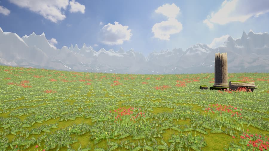 A broken column of the old world standing in a field of flowers